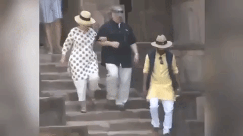 hillary-clinton-slips-and-almost-falls-twice-on-the-stairs-of-jahaz-mahal-while-in-india-740x500-3-15209343251.gif